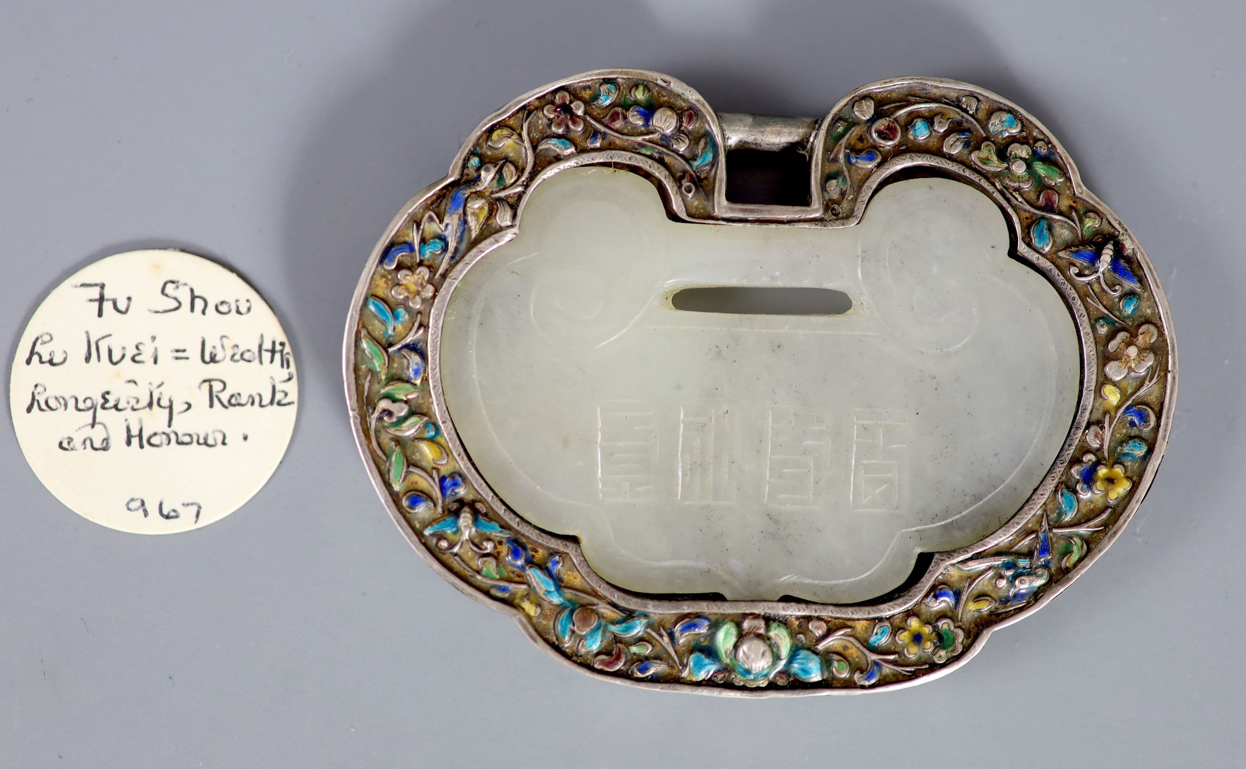 A Chinese silver and enamel mounted white jade spirit lock pendant, Provenance - A. T. Arber-Cooke